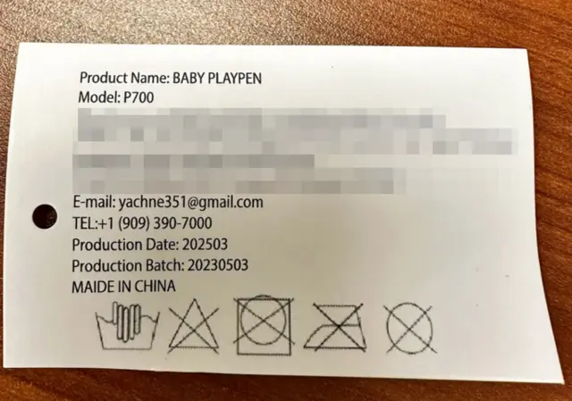 Play Yards Recalled Due to Risk of Serious Injury or Death from Suffocation and Entrapment Hazards; Violate Mandatory Standard for Play Yards; Sold on Amazon by Anna Queen: Removable tag with model number "P700", photo 2 of 3