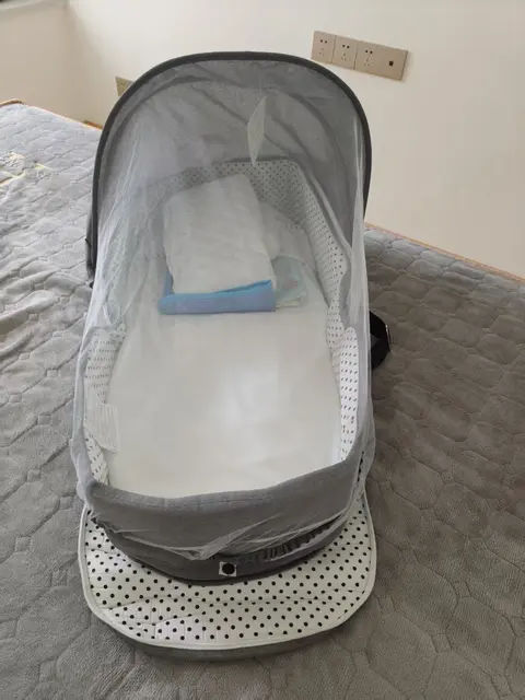 ZHORANGE Portable Bassinets Recalled Due to Risk of Serious Injury or Death from Fall Hazard; Violation of Federal Standard for Infant Sleep Products; Sold on Amazon.com by DFD Trading: Recalled ZHORANGE Baby portable bassinet (front), photo 4 of 4