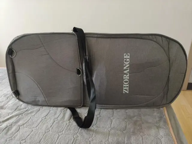 ZHORANGE Portable Bassinets Recalled Due to Risk of Serious Injury or Death from Fall Hazard; Violation of Federal Standard for Infant Sleep Products; Sold on Amazon.com by DFD Trading: Recalled ZHORANGE Baby portable bassinet (bottom), photo 3 of 4