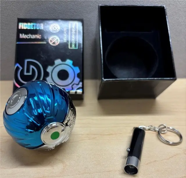 Luminous Fidget Spinner Balls Recalled Due to Risk of Serious Injury or Death from Battery Ingestion; Violates Mandatory Standard for Toys; Sold on Amazon by Anzmtosn: Recalled Anzmtosn Luminous Fidget Spinner Ball with Mini Flashlight, photo 1 of 2