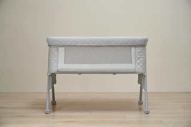 AirClub Convertible Bassinets Recalled Due to Risk of Serious Injury or Death from Fall Hazard; Violates Mandatory Standard for Bedside Sleepers: Recalled AirClub Convertible Bassinet – Front View light grey, photo 1 of 4