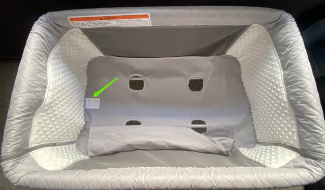 AirClub Convertible Bassinets Recalled Due to Risk of Serious Injury or Death from Fall Hazard; Violates Mandatory Standard for Bedside Sleepers: "Product Model: QX-831" is printed on a label located on bottom of the convertible bassinets underneath the mattress pad, photo 3 of 4