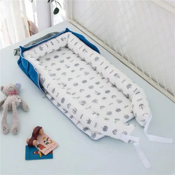 Wayfair Recalls Style Life Eleven Baby Loungers Due to Suffocation Risk and Fall Hazard; Violation of Federal Regulations for Infant Sleep Products; Sold Exclusively on Wayfair.com by Bespoke Clothing Valley (Royalbelle) through Zoomie Kids (Recall Alert): Recalled Style Life Eleven Portable Baby Loungers in the Pattern of Blue/White Crowns, photo 2 of 4