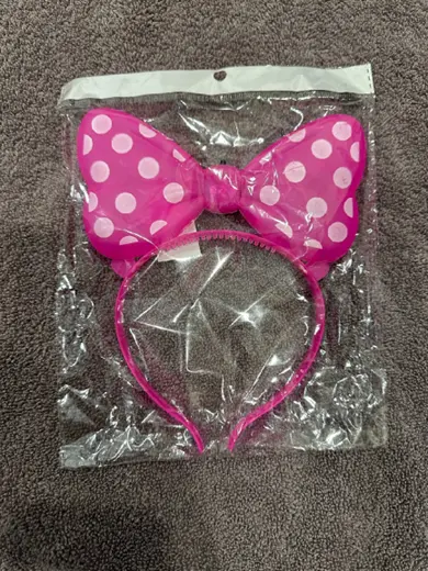 ABC Trading Recalls Children's Toys Due to Risk of Serious Injury or Death from Battery Ingestion; Violates Mandatory Standard for Toys: Recalled Toy Headband - Pink Bow with White Polka Dots, photo 1 of 4