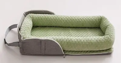 Joyful Journeys Recalls Baby Loungers Due to Risk of Serious Injury or Death from Entrapment and Fall Hazards; Violates Mandatory Standard for Infant Sleep Products: Recalled Joyful Journeys Baby Lounger in green minky, photo 2 of 4