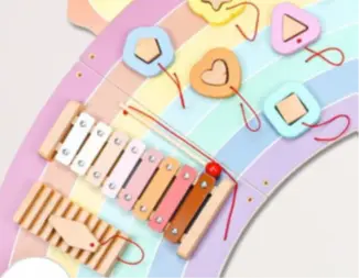 Rainbow Wall Toys Recalled Due to Risk of Serious Injury or Death from Choking Hazard; Violate Mandatory Standard for Children's Toys; Sold on Amazon by Justforjoyful: Close-up of Drumstick Attached to Xylophone Component, photo 2 of 2