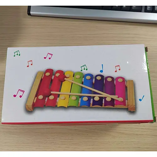 Hand knocks the xylophone, photo 1 of 4