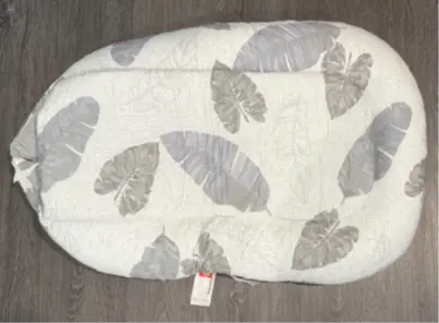 Bearlala Baby Loungers Recalled Due to Risk of Serious Injury or Death from Entrapment and Fall Hazards; Violates Mandatory Standard for Infant Sleep Products; Sold on Walmart.com by Nuoxuann: Recalled Bearlala Baby Lounger Bottom View, photo 2 of 3