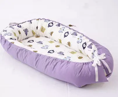 Alinux Baby Loungers Recalled Due to Risk of Serious Injury or Death from Entrapment and Fall Hazards; Violates Mandatory Standard for Infant Sleep Products; Sold on Amazon by Winkids: Recalled Alinux Baby Lounger in Purple, photo 2 of 4