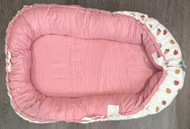 Alinux Baby Loungers Recalled Due to Risk of Serious Injury or Death from Entrapment and Fall Hazards; Violates Mandatory Standard for Infant Sleep Products; Sold on Amazon by Winkids: Recalled Alinux Baby Lounger in Pink, photo 1 of 4