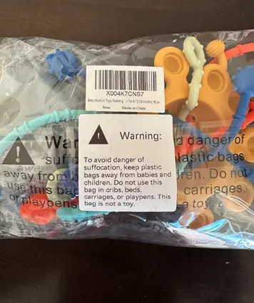 CuddleCubs Creations Teething Toy Sets Recalled Due to Risk of Serious Injury or Death from Choking; Violate Mandatory Standard for Toys; Sold on Amazon by YouRfocus: Recalled CuddleCubs Creations Baby Highchair Teething Toy Set (outer packaging), photo 4 of 4